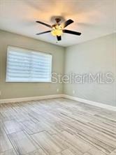 512 Wideview Avenue Tarpon Springs, FL 34689 - Photo 23 of 30 a view of an empty room with a window