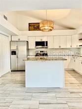 512 Wideview Avenue Tarpon Springs, FL 34689 - Photo 9 of 30 a view of a kitchen