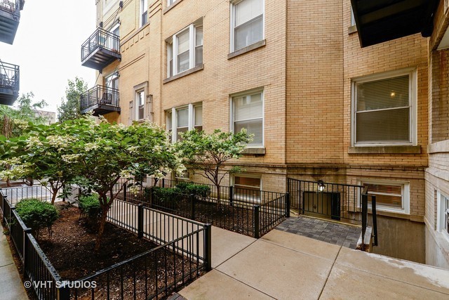 2549 North Clark Street, Unit G Chicago, IL 60614 - Photo 8 of 8 a view of a patio with chairs and potted plants