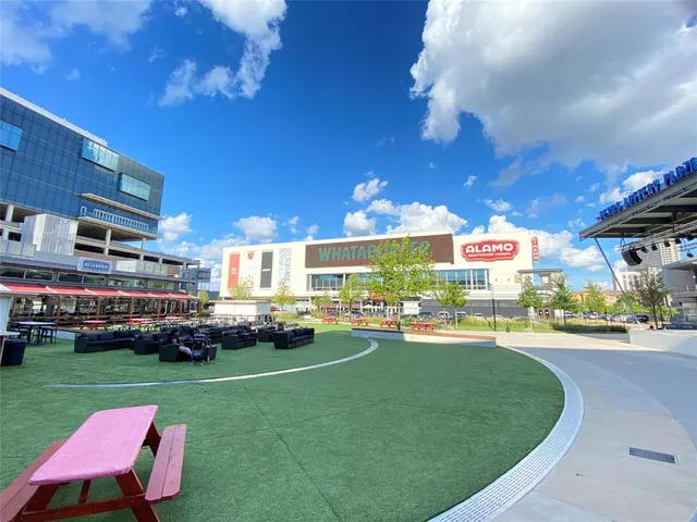 a view of a play ground in front of the house
