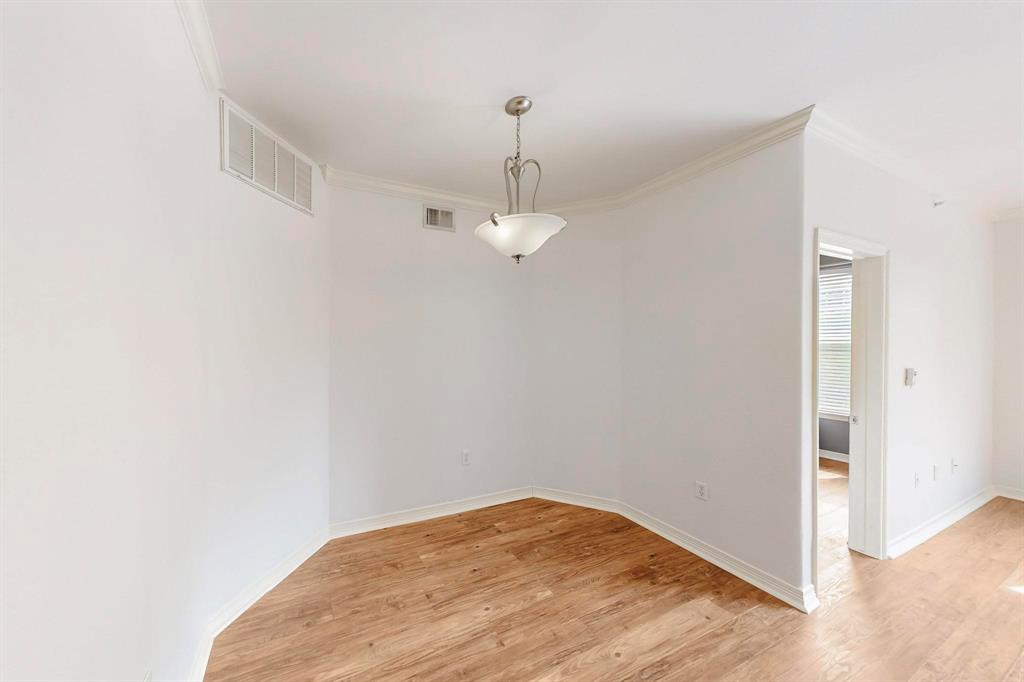 330 Las Colinas Boulevard East, Unit 342 Irving, TX 75039 - Photo 5 of 19 a view of a room with wooden floor and ceiling fan