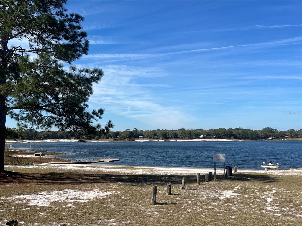 6287 Magnolia Street Keystone Heights, FL 32656 - Photo 27 of 27 a view of a lake with outdoor space