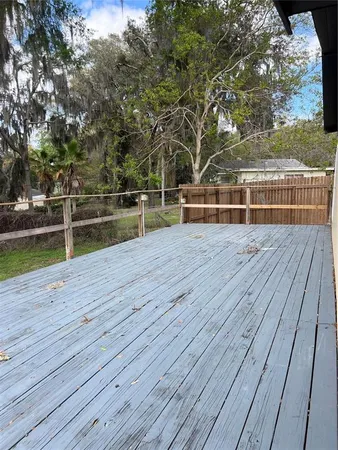 a view of outdoor space with wooden deck