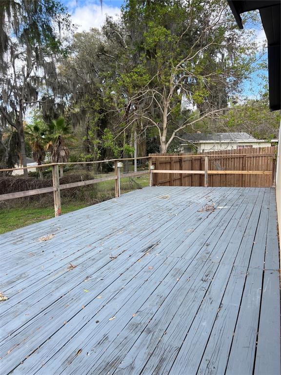 6287 Magnolia Street Keystone Heights, FL 32656 - Photo 9 of 27 a view of outdoor space with wooden deck
