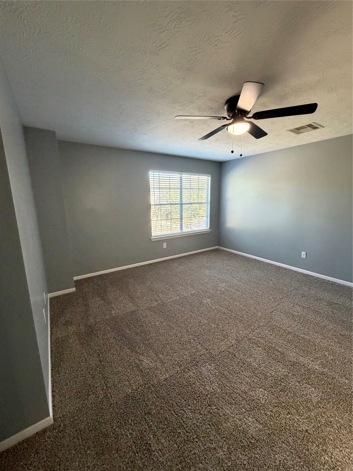 4623 Mi Castillo Court Houston, TX 77045 - Photo 15 of 25 a view of an empty room with a window