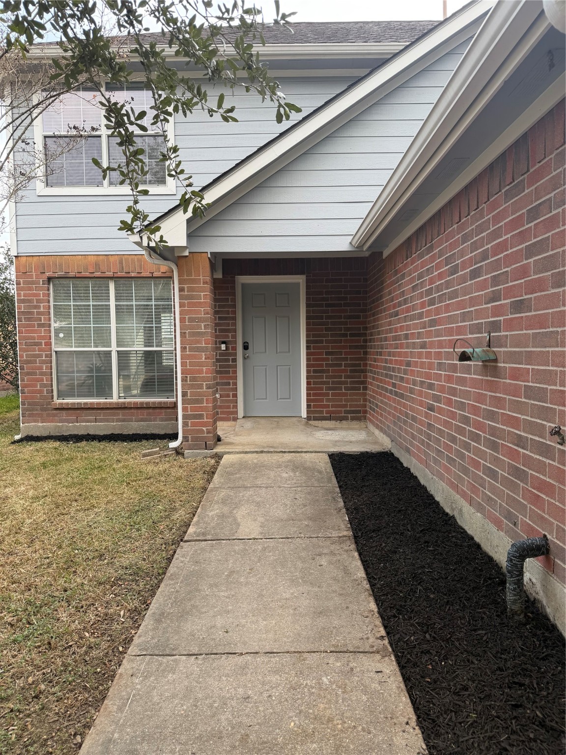 4623 Mi Castillo Court Houston, TX 77045 - Photo 2 of 25 a view of a house with a yard