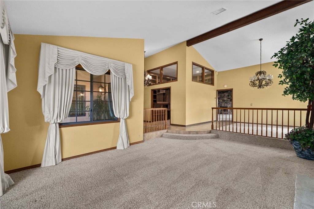 5297 Amethyst Street Rancho Cucamonga, CA 91737 - Photo 12 of 64 a view of a porch with wooden floor and fence