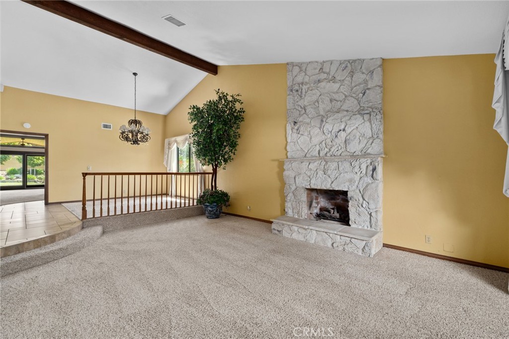 5297 Amethyst Street Rancho Cucamonga, CA 91737 - Photo 13 of 64 a view of a livingroom with a fireplace