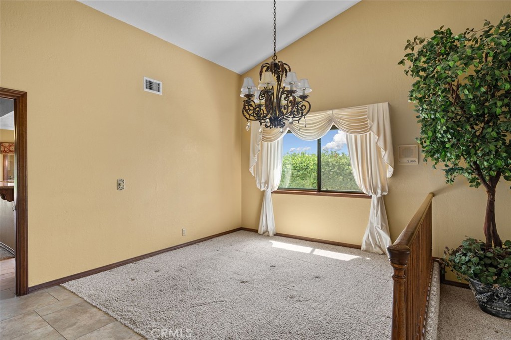 5297 Amethyst Street Rancho Cucamonga, CA 91737 - Photo 14 of 64 a view of entryway and hall with wooden floor