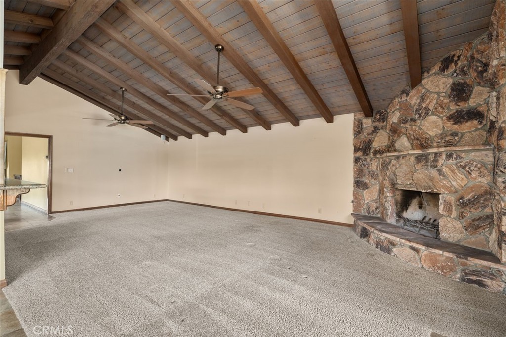 5297 Amethyst Street Rancho Cucamonga, CA 91737 - Photo 17 of 64 a view of an empty room with a fireplace