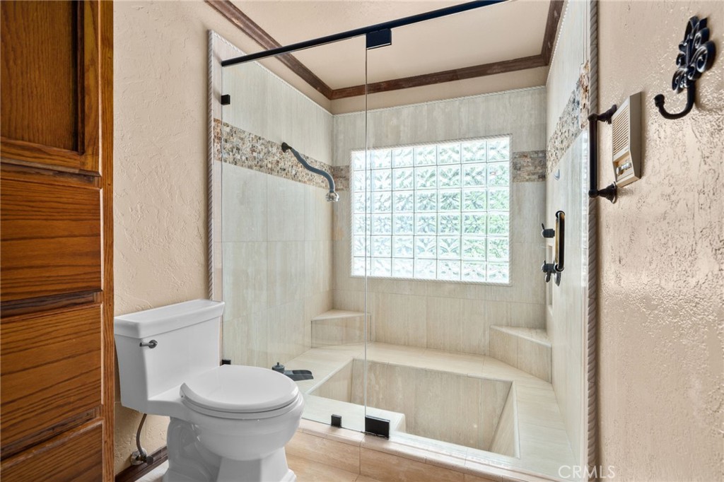 5297 Amethyst Street Rancho Cucamonga, CA 91737 - Photo 28 of 64 a bathroom with a sink and a bathtub