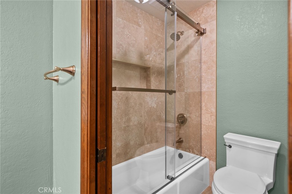 5297 Amethyst Street Rancho Cucamonga, CA 91737 - Photo 36 of 64 a bathroom with a toilet and a shower