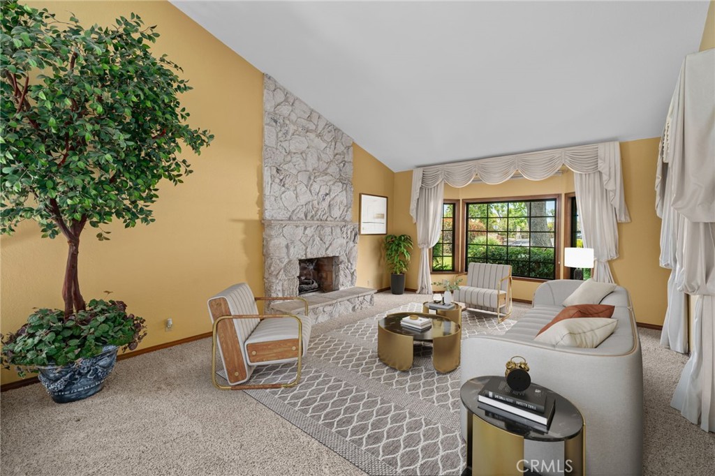 5297 Amethyst Street Rancho Cucamonga, CA 91737 - Photo 4 of 64 a living room with furniture and a potted plant