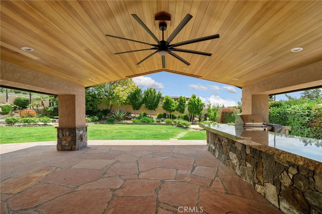 5297 Amethyst Street Rancho Cucamonga, CA 91737 - Photo 46 of 64 a view of a porch with furniture and backyard