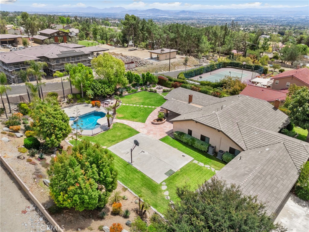 5297 Amethyst Street Rancho Cucamonga, CA 91737 - Photo 58 of 64 an aerial view of residential houses with outdoor space and parking