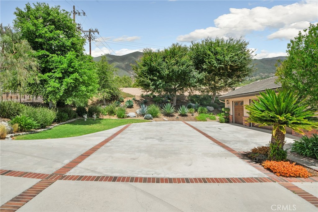 5297 Amethyst Street Rancho Cucamonga, CA 91737 - Photo 62 of 64 a view of a house with a yard