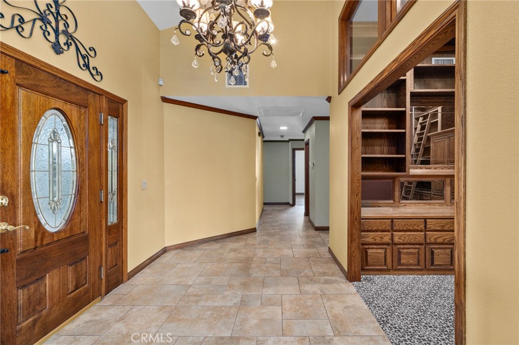 5297 Amethyst Street Rancho Cucamonga, CA 91737 - Photo 9 of 64 a view of a entryway door of the house