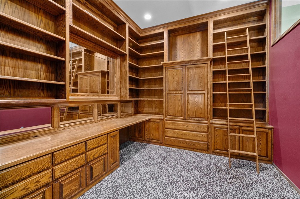5297 Amethyst Street Rancho Cucamonga, CA 91737 - Photo 10 of 64 a view of an empty room with a staircase