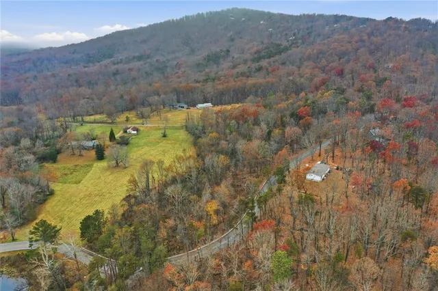 a view of swimming pool from a yard