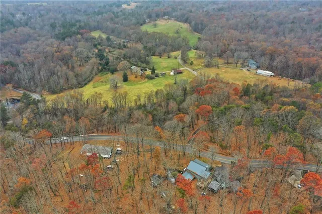 a view of residential houses with outdoor space