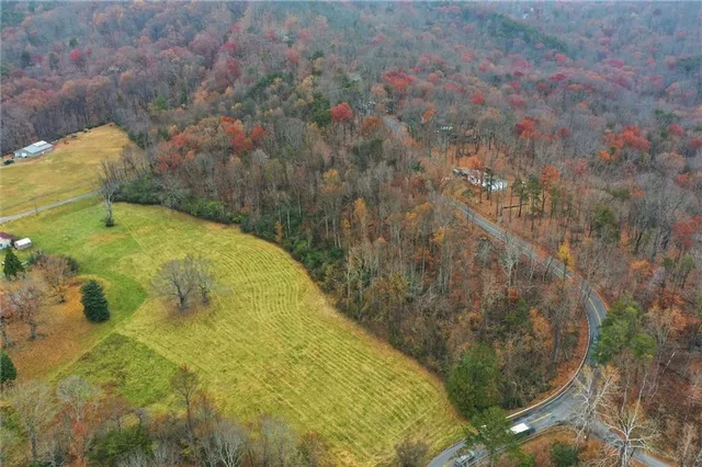 a view of a house with trees
