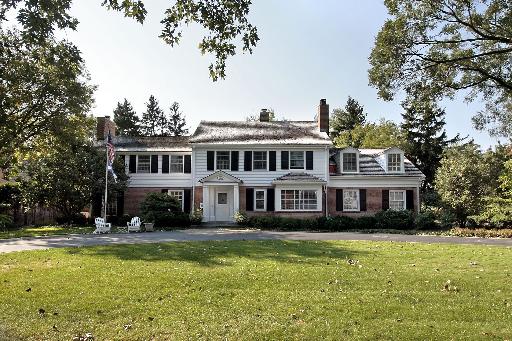 1080 Sunset Road Winnetka, IL 60093 - Photo 1 of 1 a front view of a house with swimming pool
