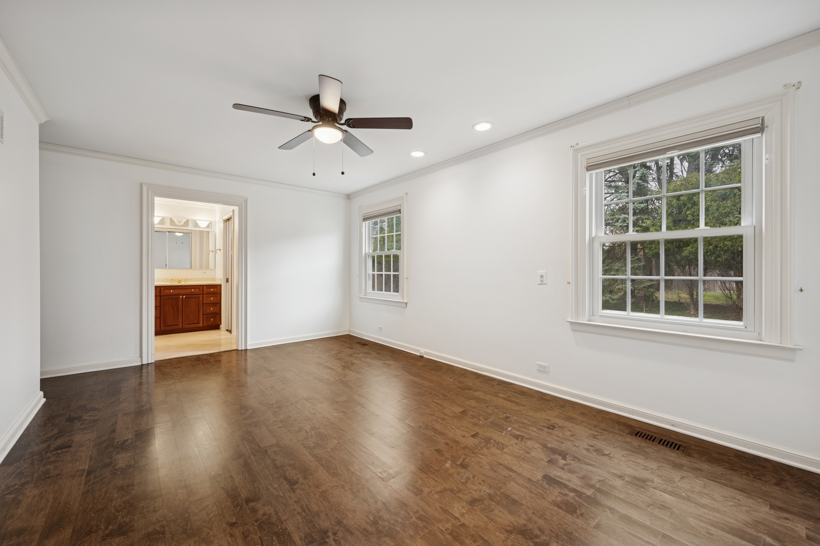 3844 Grace Lane Glenview, IL 60025 - Photo 19 of 34 a view of an empty room with a window and wooden floor