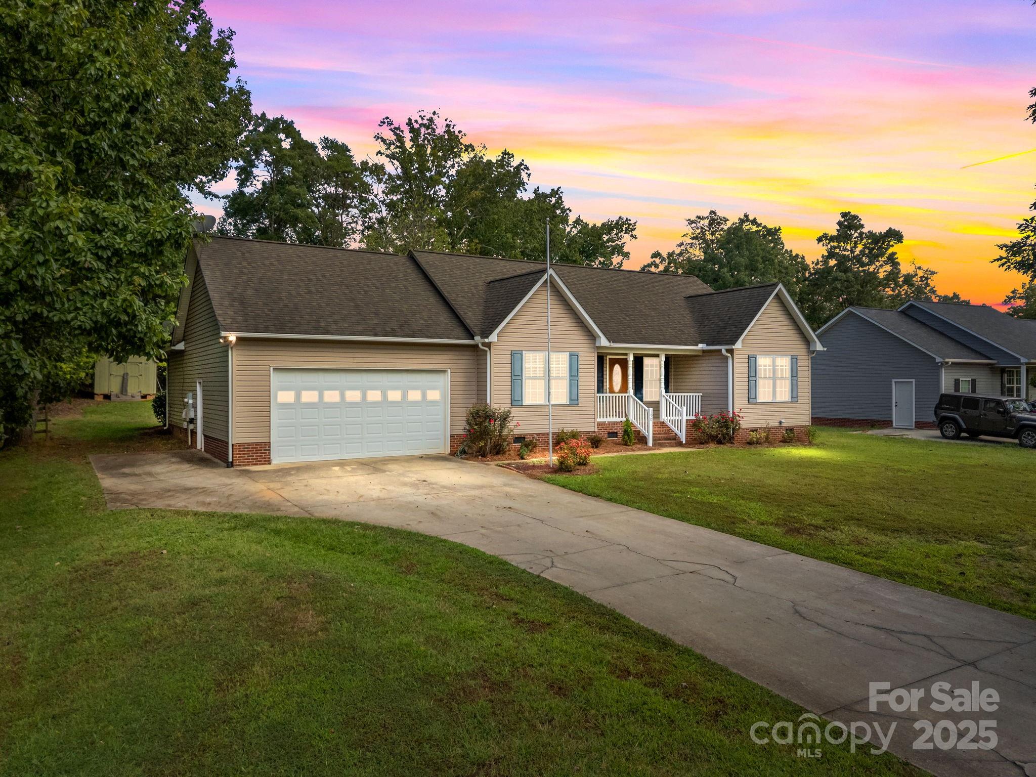 190 Teague Road Salisbury, NC 28146 - Photo 1 of 44 a front view of a house with a yard and garage