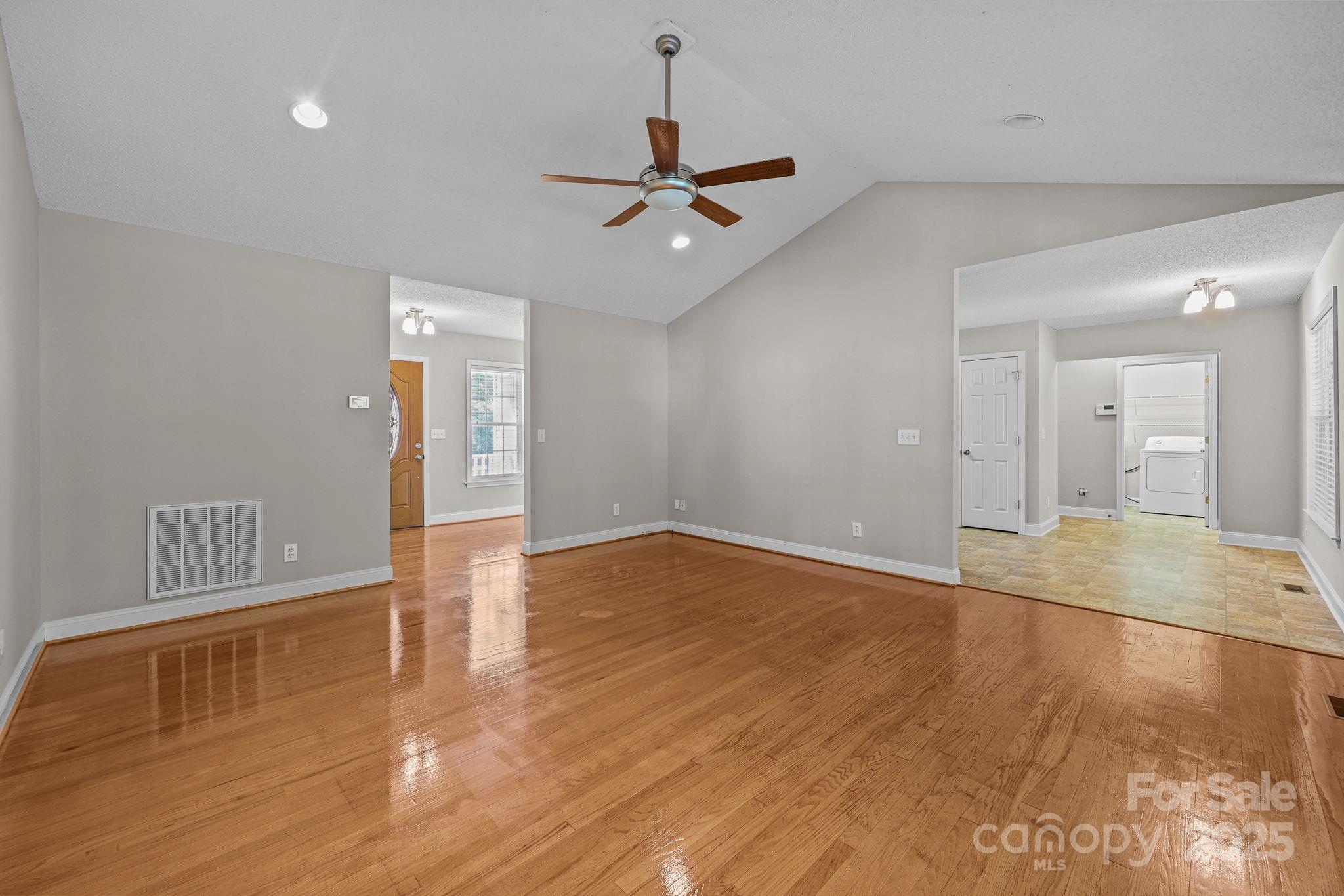 190 Teague Road Salisbury, NC 28146 - Photo 16 of 44 a view of empty room with wooden floor and fan