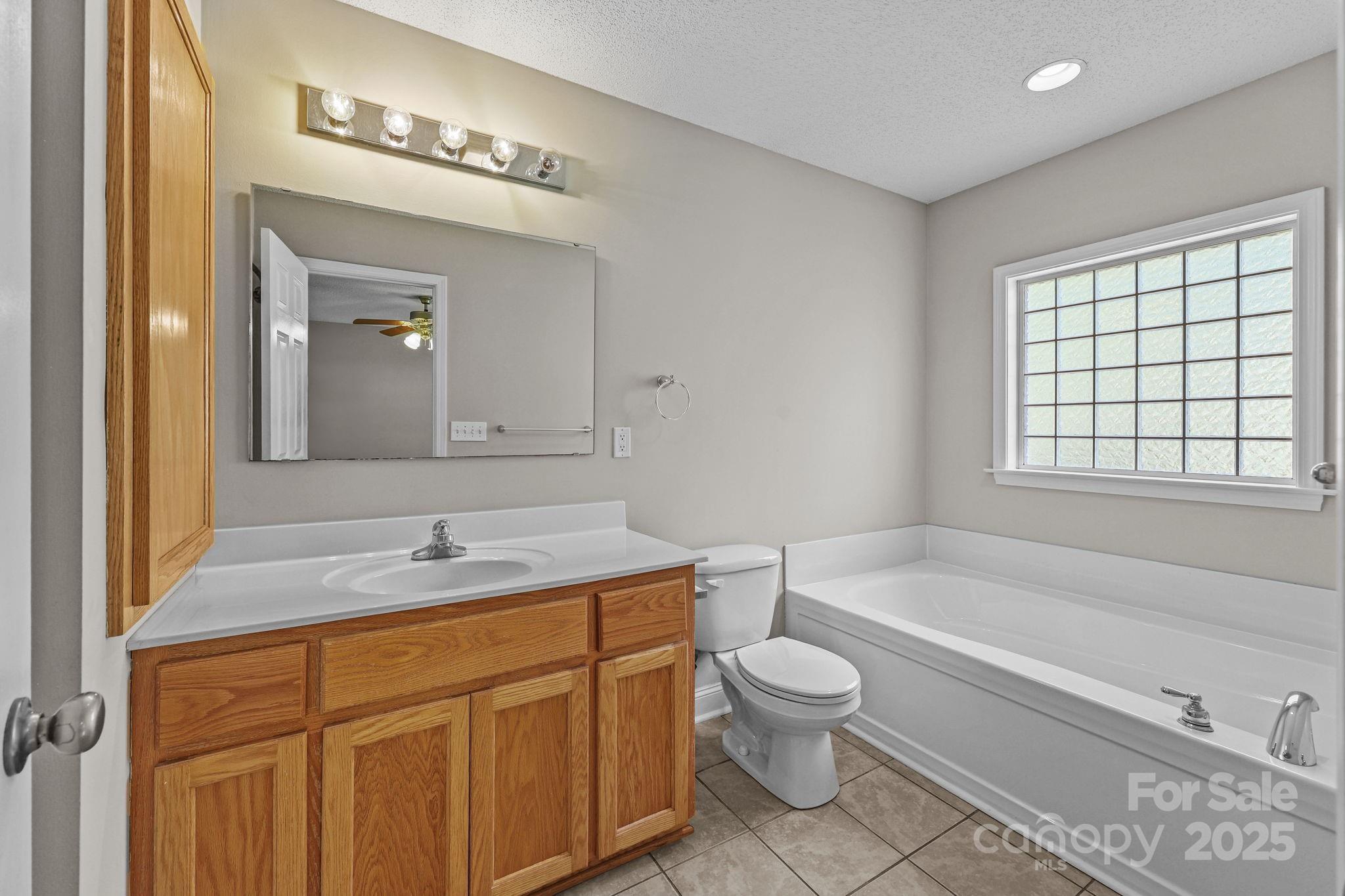 190 Teague Road Salisbury, NC 28146 - Photo 26 of 44 a bathroom with a sink a toilet and bathtub