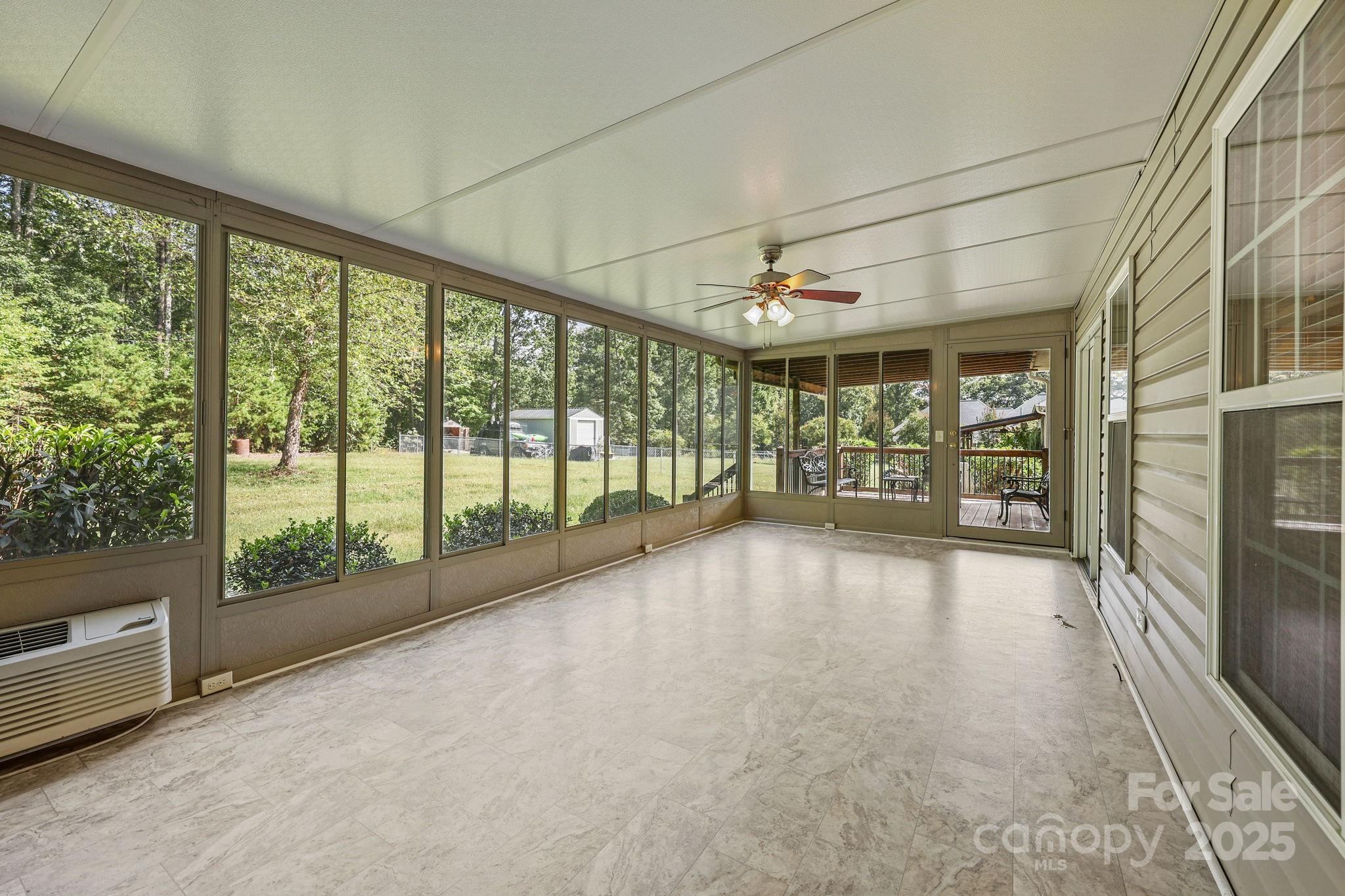 190 Teague Road Salisbury, NC 28146 - Photo 38 of 44 a view of an empty room with a sliding door