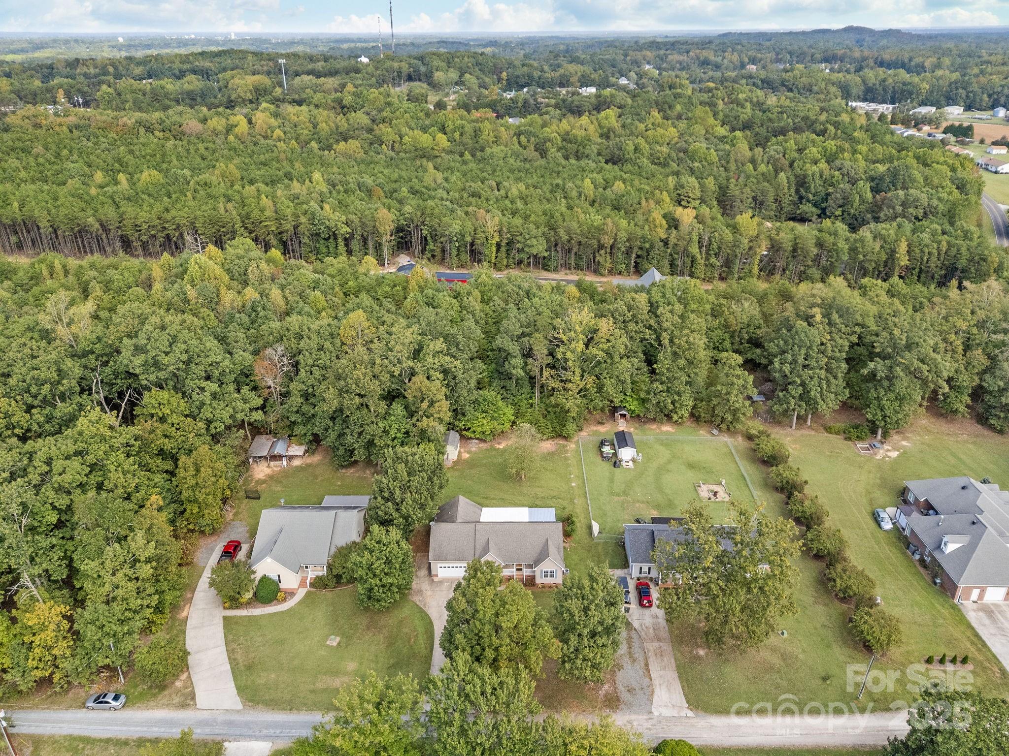 190 Teague Road Salisbury, NC 28146 - Photo 6 of 44 an aerial view of residential houses with outdoor space and trees