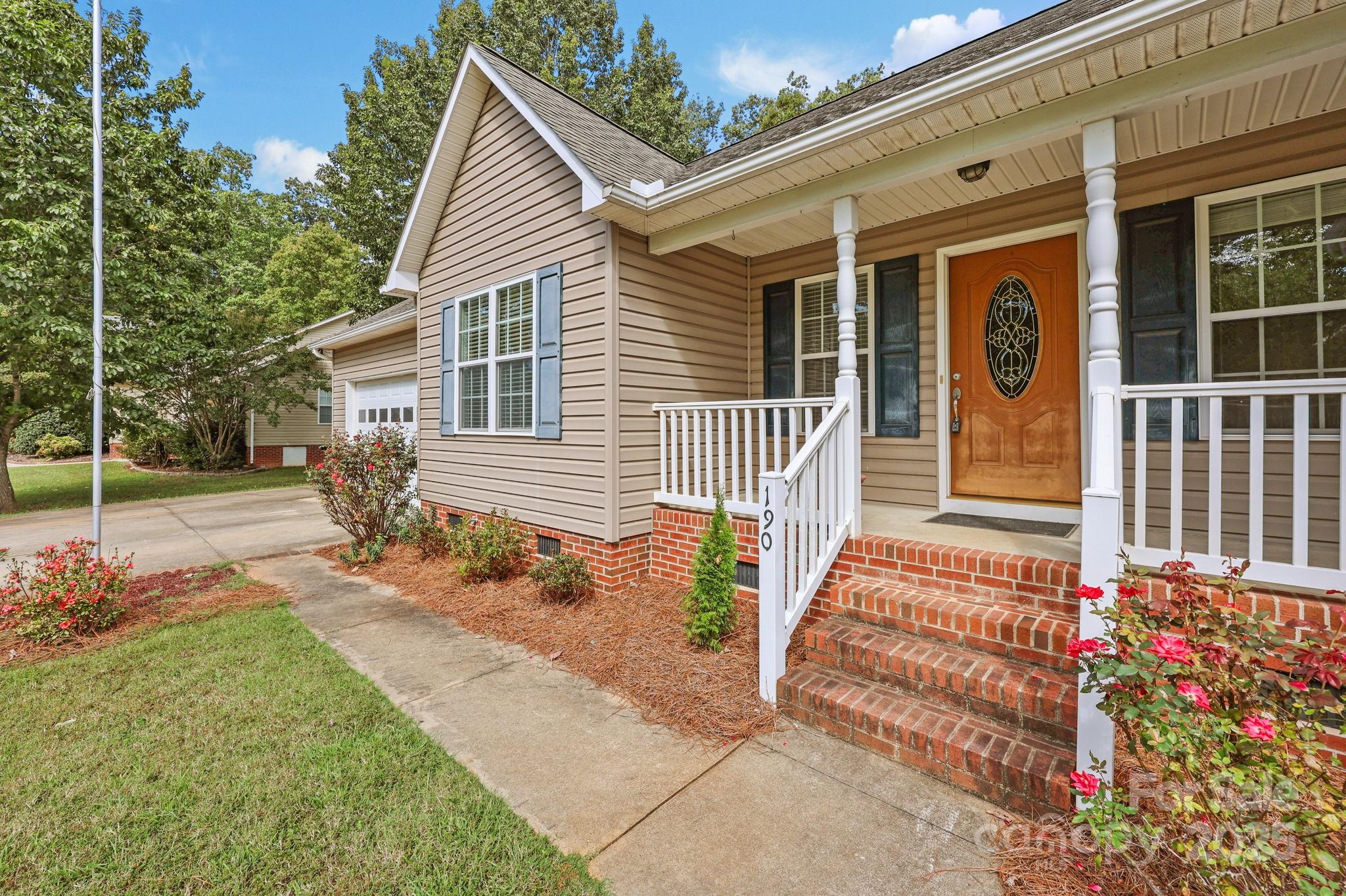 190 Teague Road Salisbury, NC 28146 - Photo 9 of 44 a front view of a house with a garden