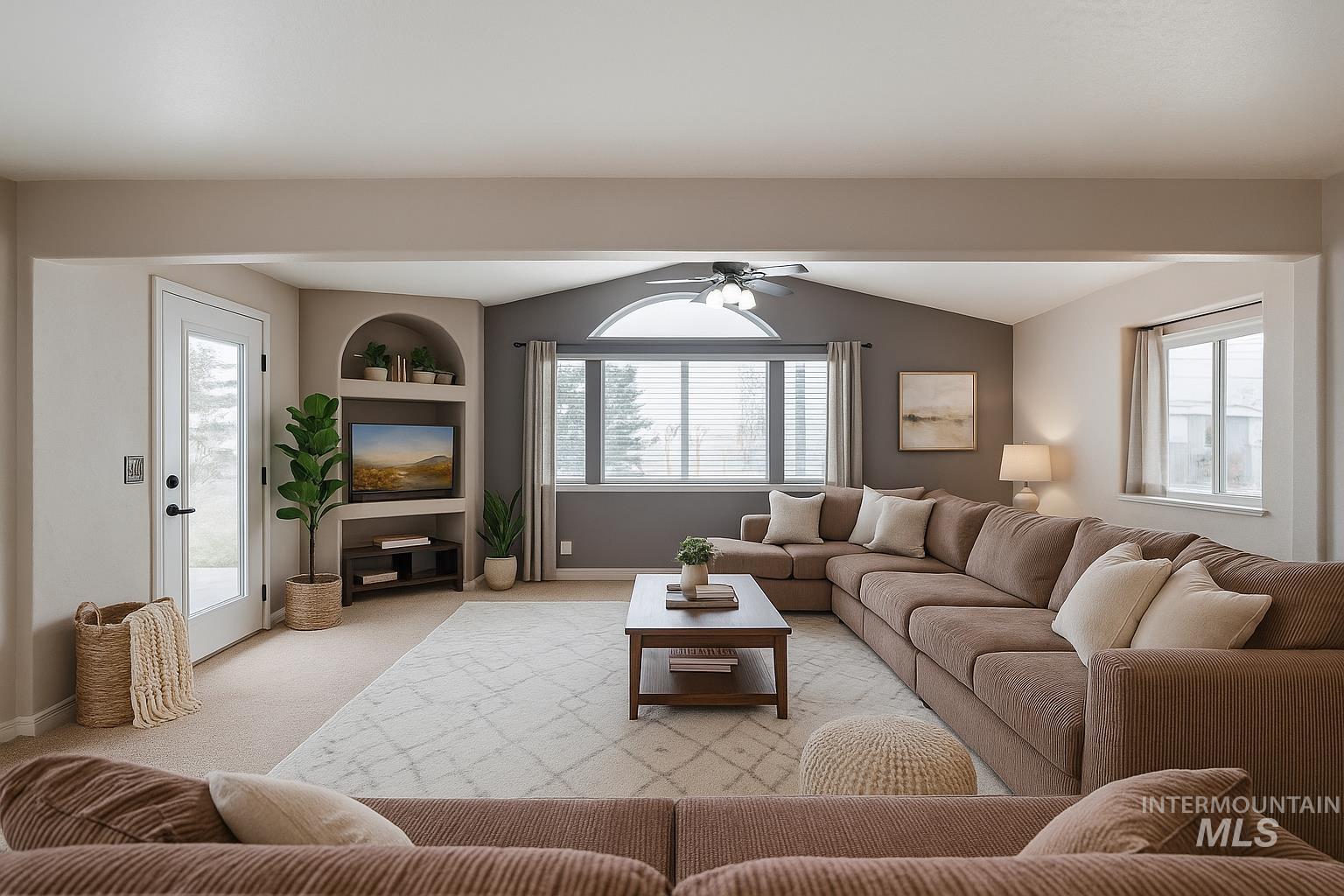 173 Fafnir Drive Kimberly, ID 83341 - Photo 4 of 42 Carpeted living area featuring ceiling fan and built in shelves