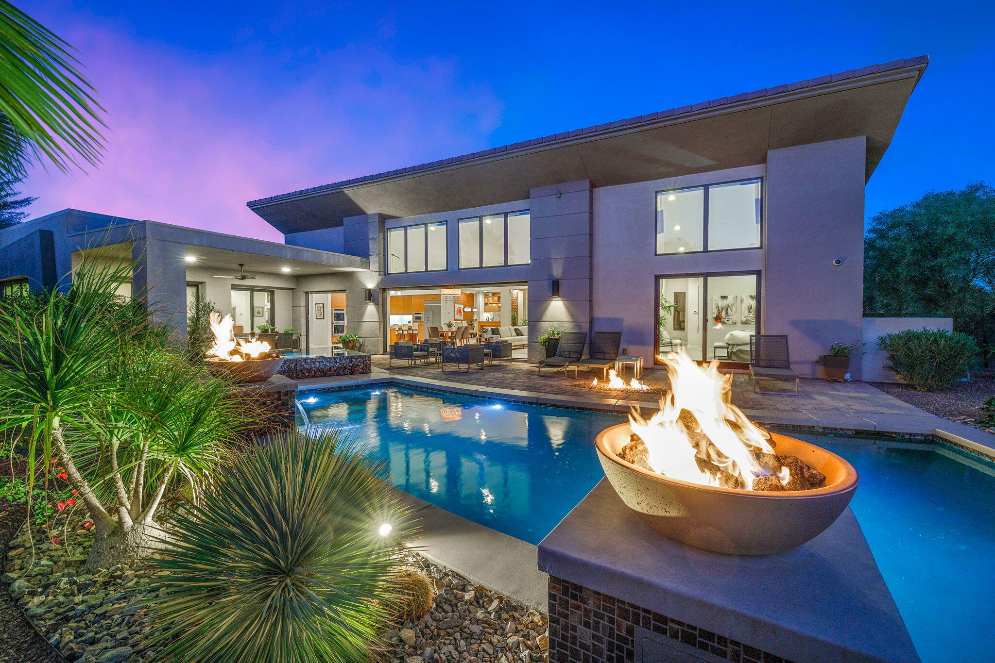 a view of a swimming pool with a patio