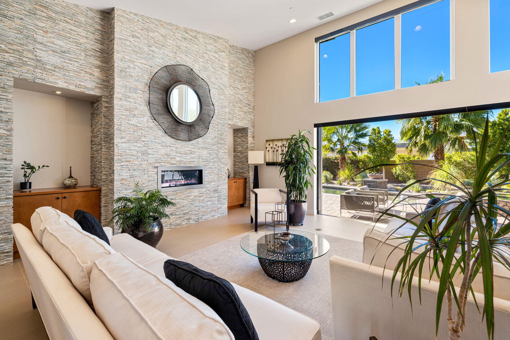 5 Via Merenda Rancho Mirage, CA 92270 - Photo 25 of 84 a living room with furniture and a large window