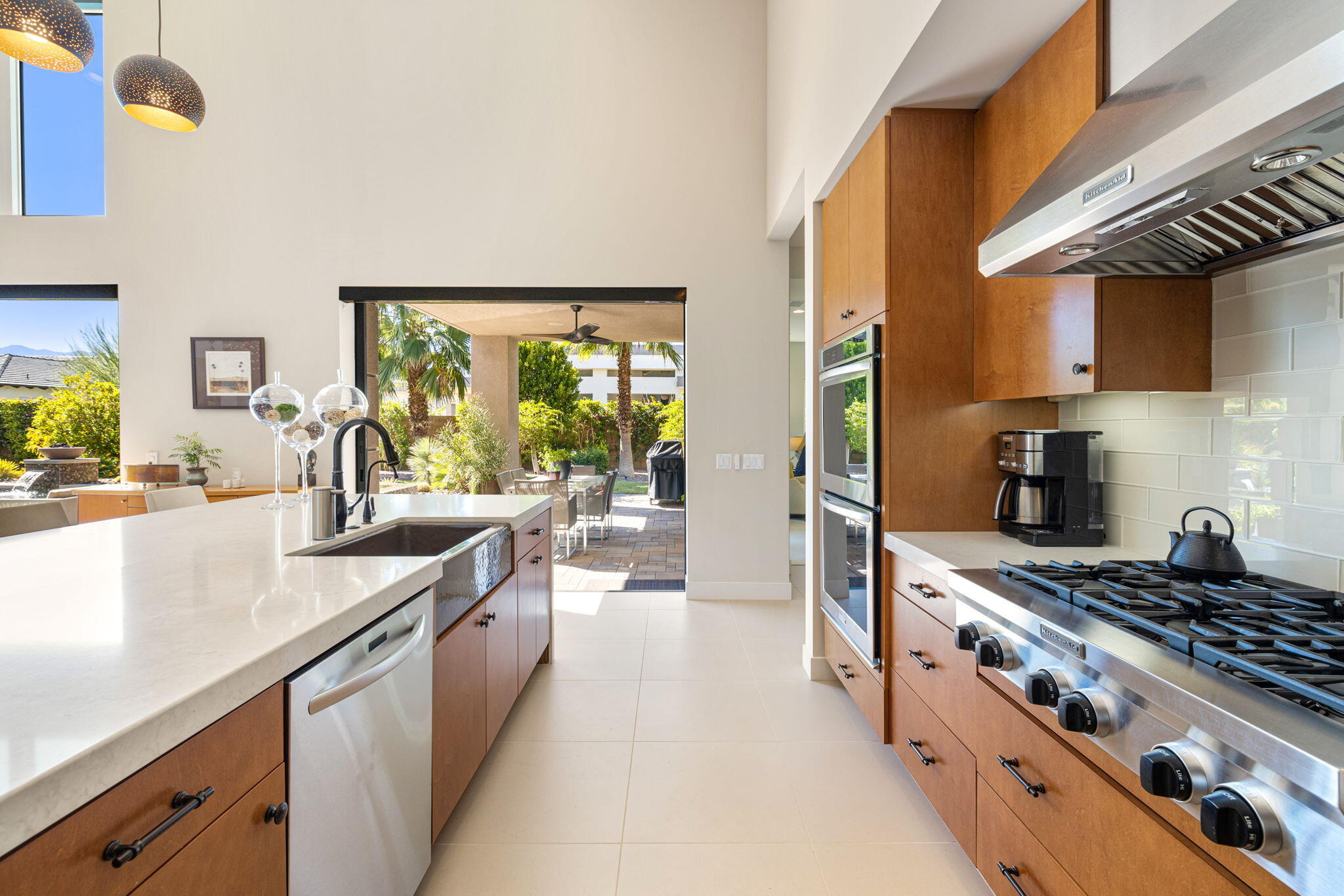 5 Via Merenda Rancho Mirage, CA 92270 - Photo 35 of 84 a large kitchen with stainless steel appliances granite countertop a lot of counter space and a sink