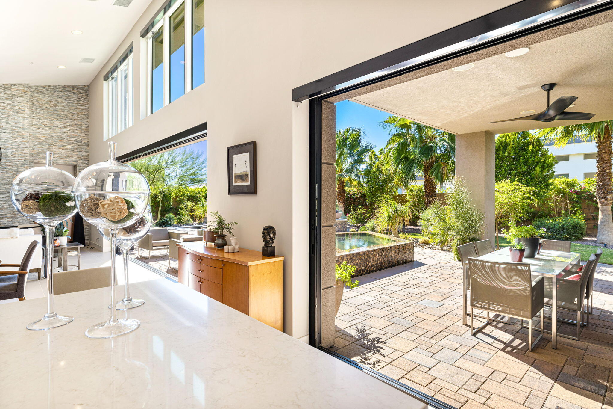 5 Via Merenda Rancho Mirage, CA 92270 - Photo 39 of 84 a living room with furniture and a large window