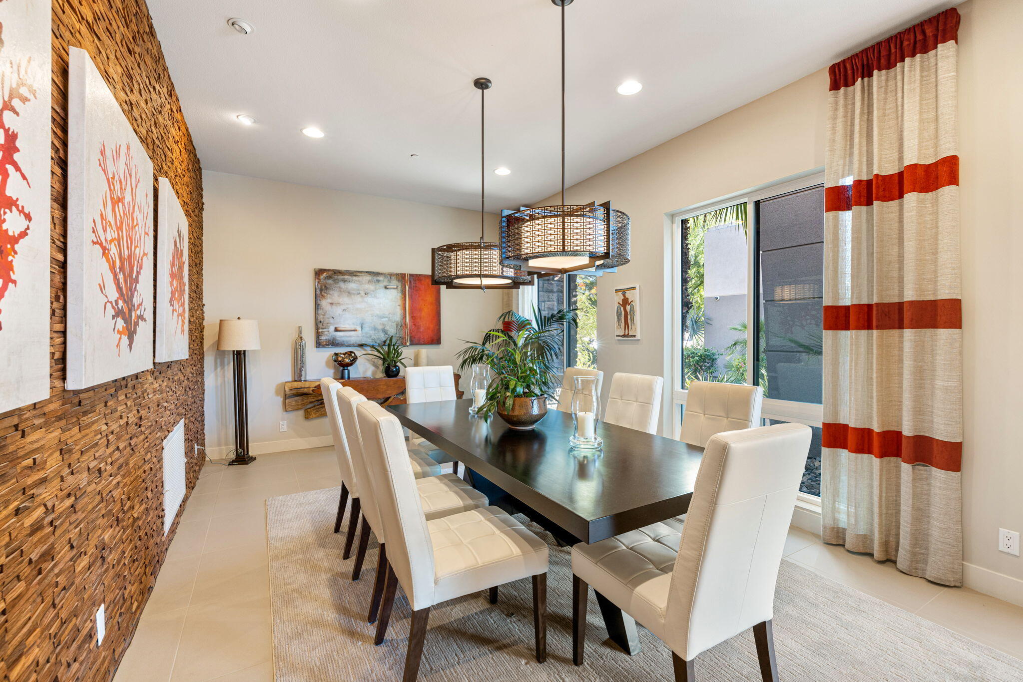 5 Via Merenda Rancho Mirage, CA 92270 - Photo 41 of 84 a view of a dining room with furniture window and wooden floor