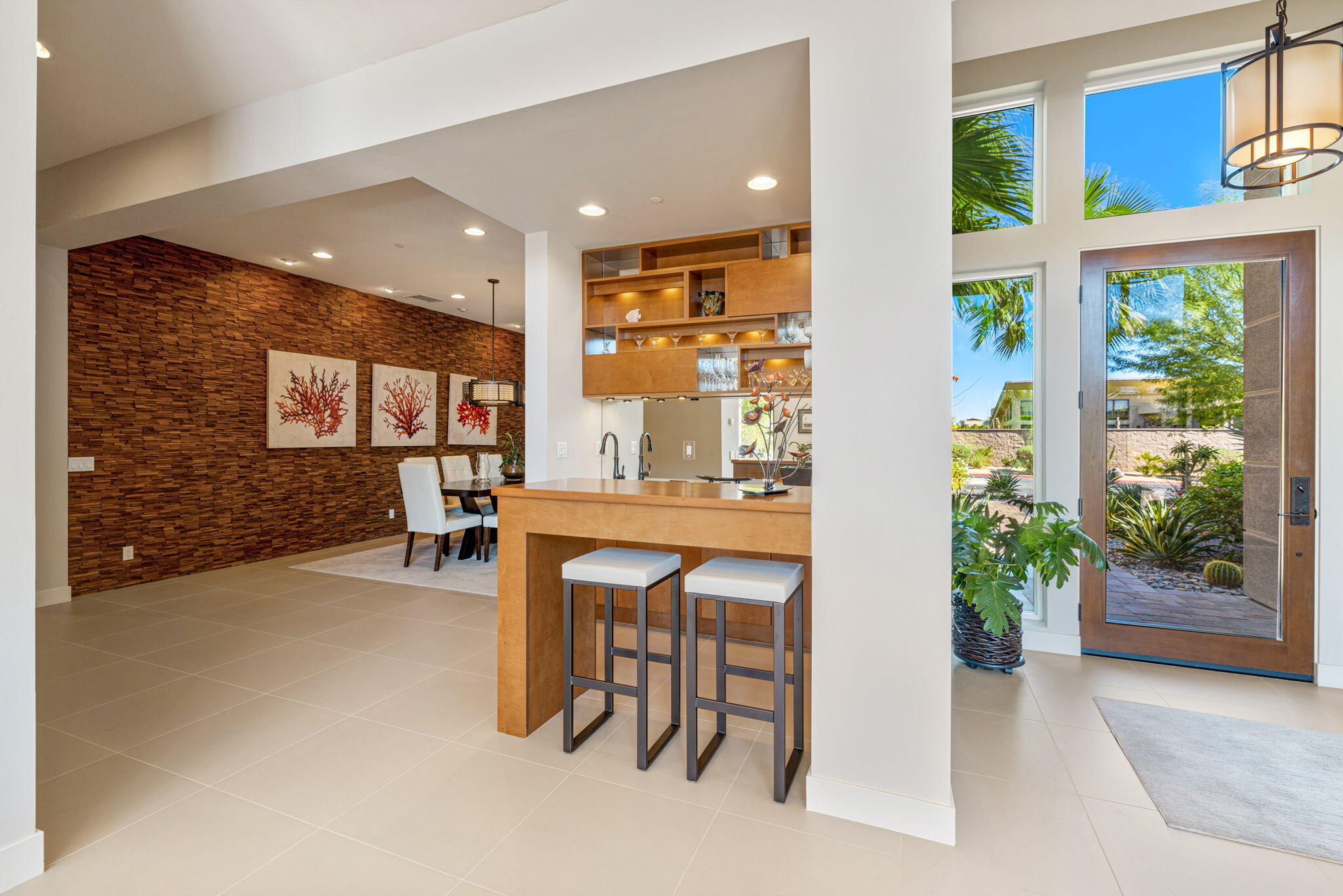 5 Via Merenda Rancho Mirage, CA 92270 - Photo 46 of 84 a dining room with furniture and a floor to ceiling window