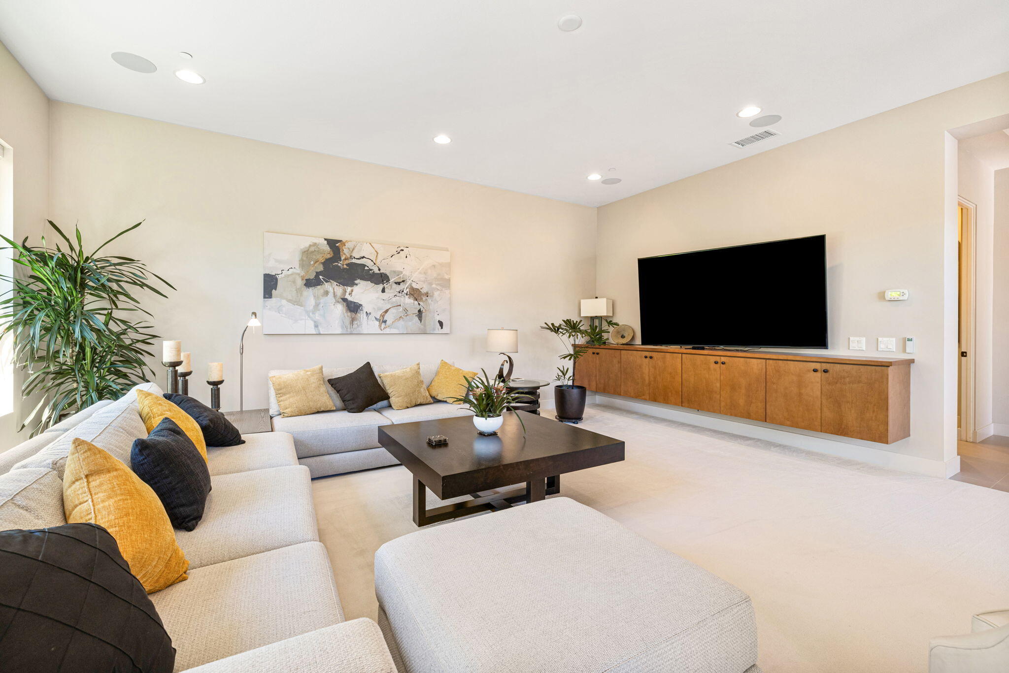 5 Via Merenda Rancho Mirage, CA 92270 - Photo 47 of 84 a living room with furniture and a flat screen tv