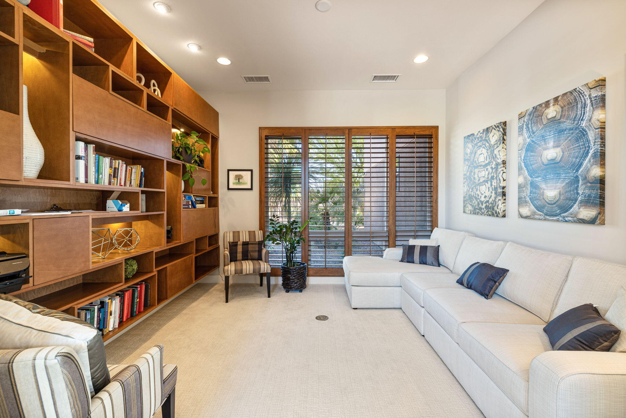 5 Via Merenda Rancho Mirage, CA 92270 - Photo 52 of 84 a living room with furniture and a large window