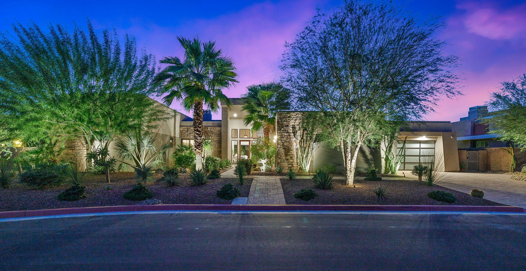 5 Via Merenda Rancho Mirage, CA 92270 - Photo 69 of 84 a view of a yard in front of a house with a fountain