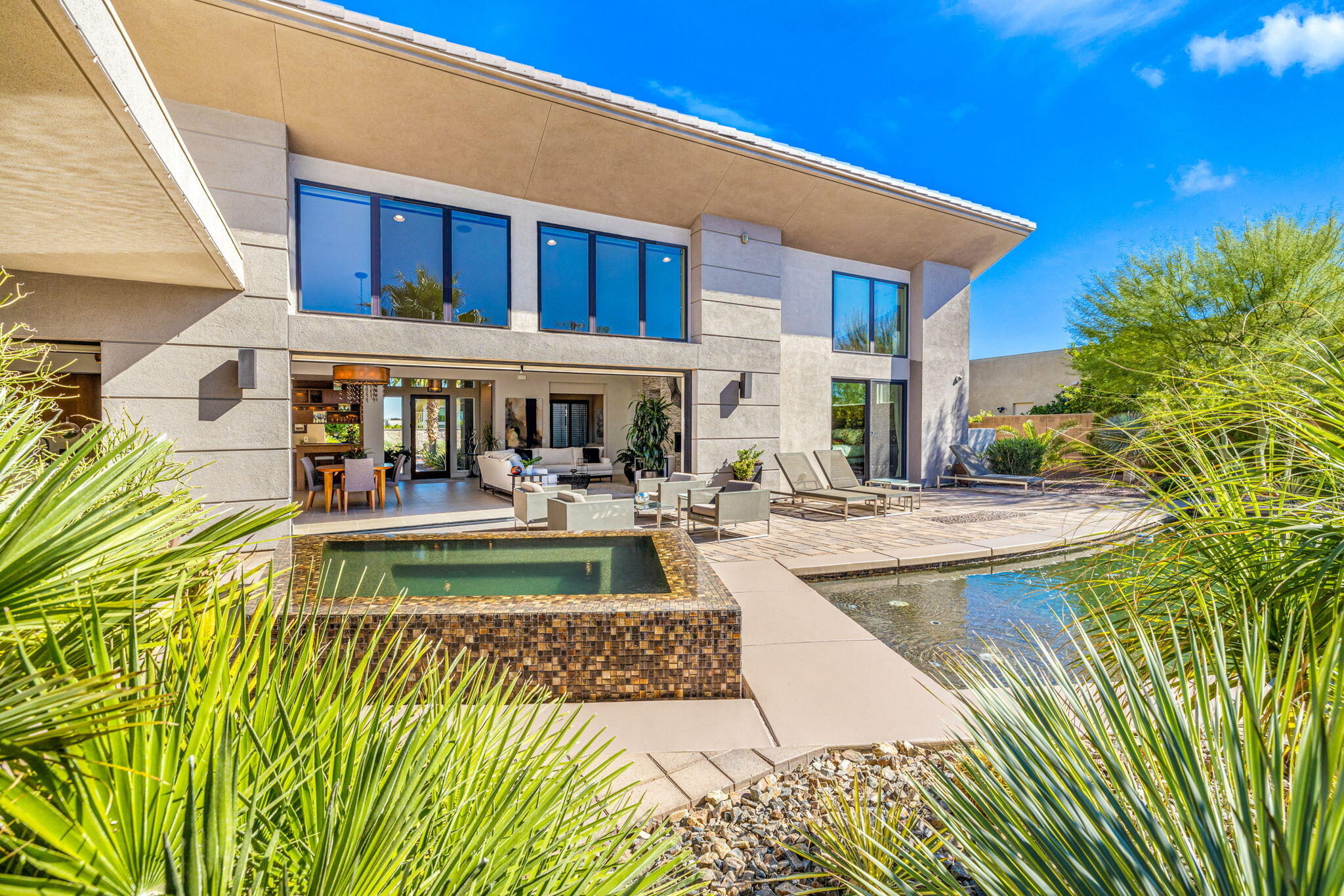 5 Via Merenda Rancho Mirage, CA 92270 - Photo 81 of 84 a view of a house with swimming pool and sitting area