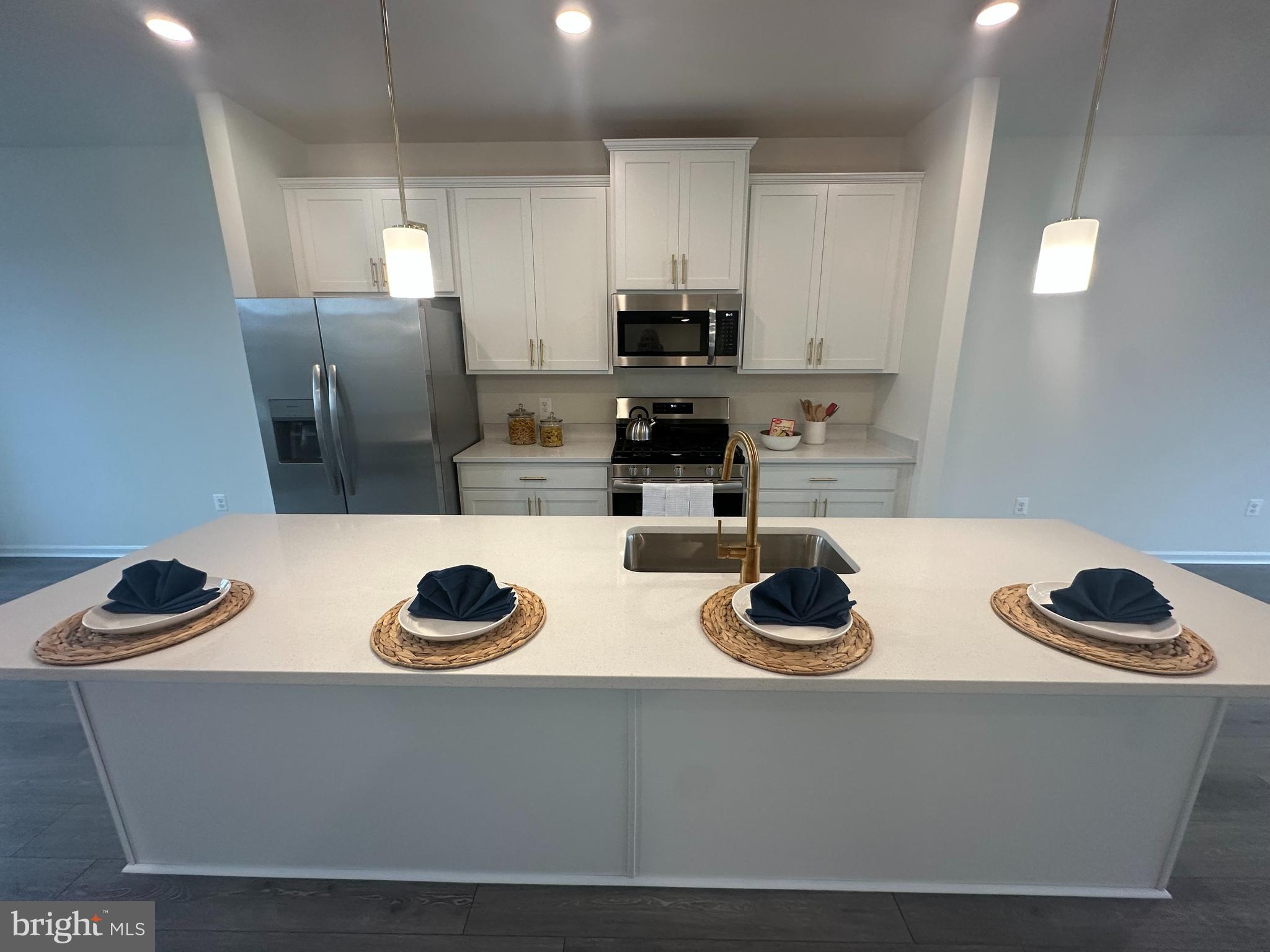 365 Purple Place Edgewood, MD 21040 - Photo 13 of 64 a kitchen with stainless steel appliances granite countertop a sink and a stove
