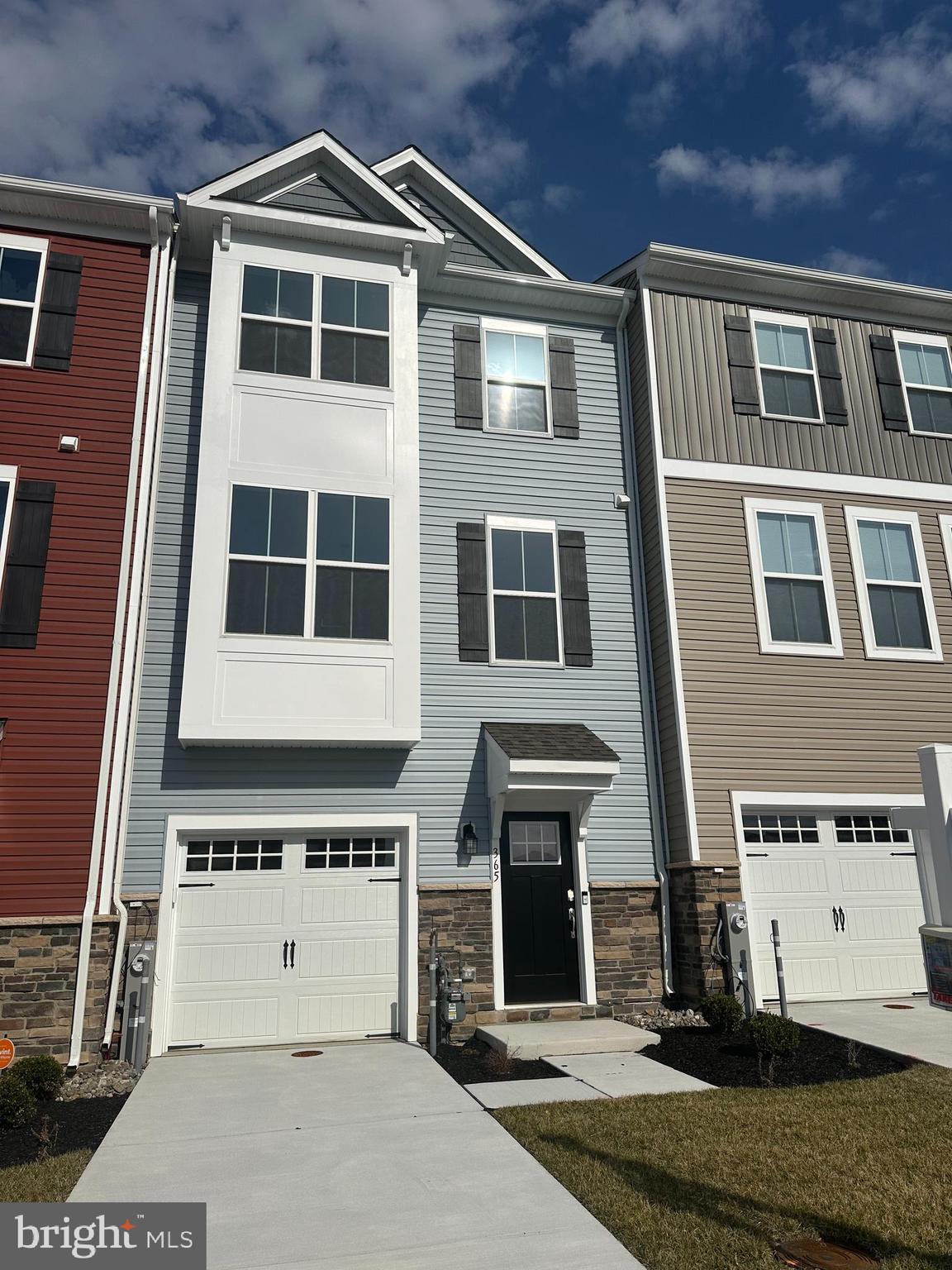 365 Purple Place Edgewood, MD 21040 - Photo 2 of 64 a front view of a building with a parking space