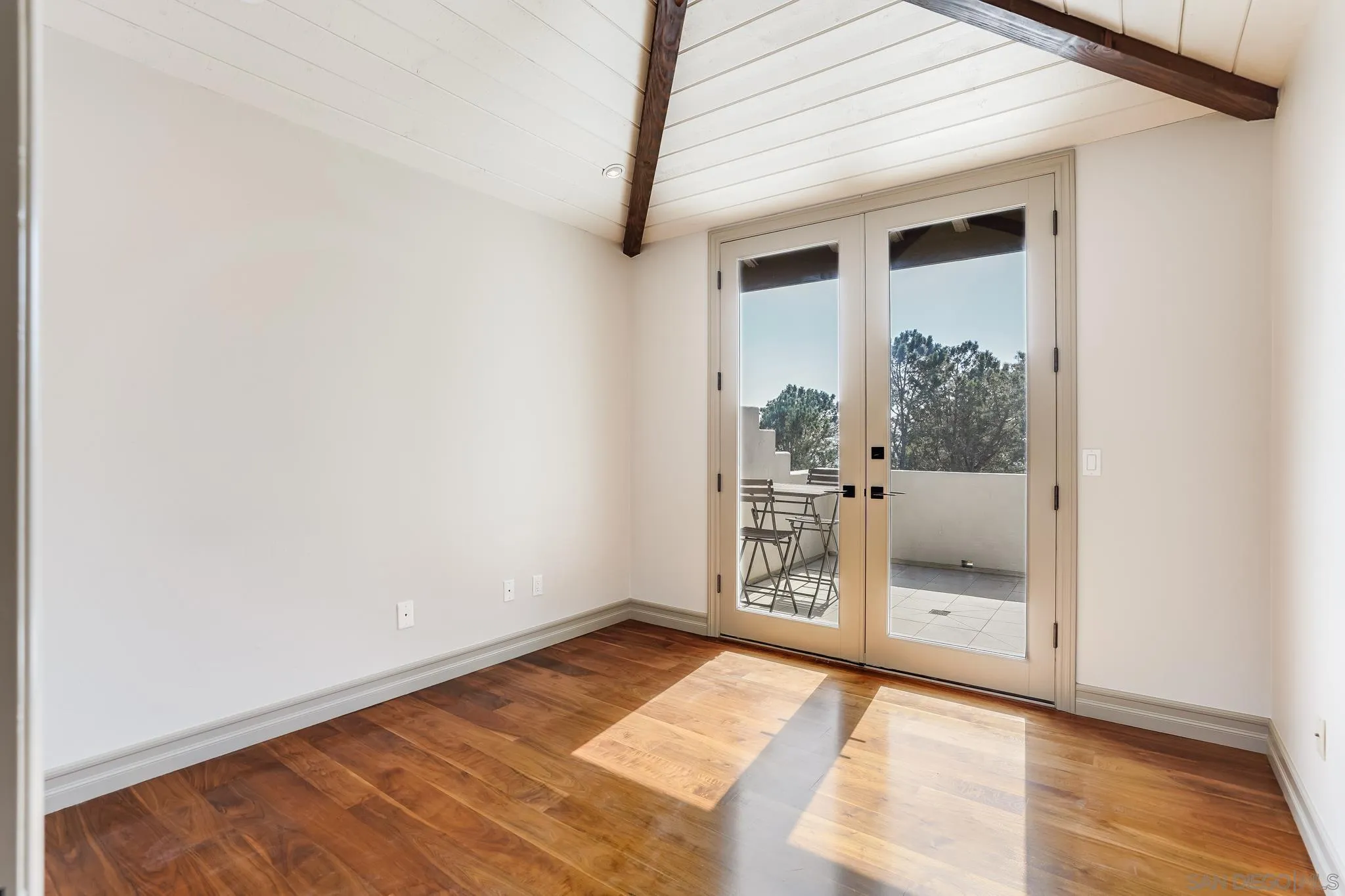1346 Crest Road Del Mar, CA 92014 - Photo 35 of 64 a view of a room that has a bed and a window in it