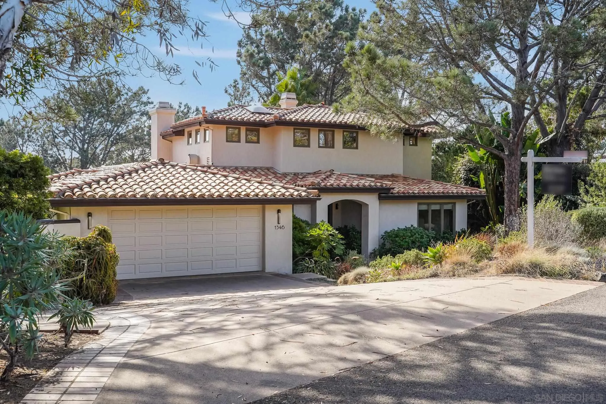 1346 Crest Road Del Mar, CA 92014 - Photo 4 of 64 front view of a house with a yard