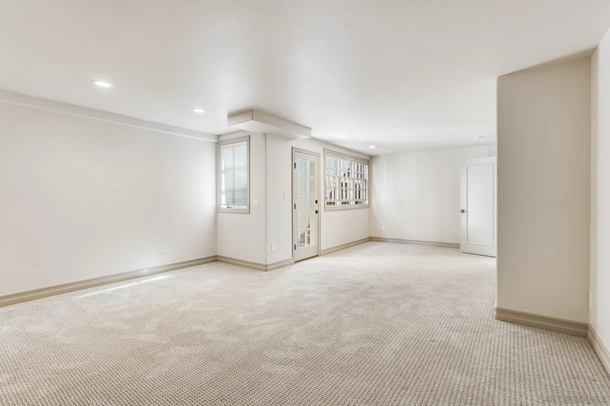 1346 Crest Road Del Mar, CA 92014 - Photo 54 of 64 an empty room with a empty space and windows