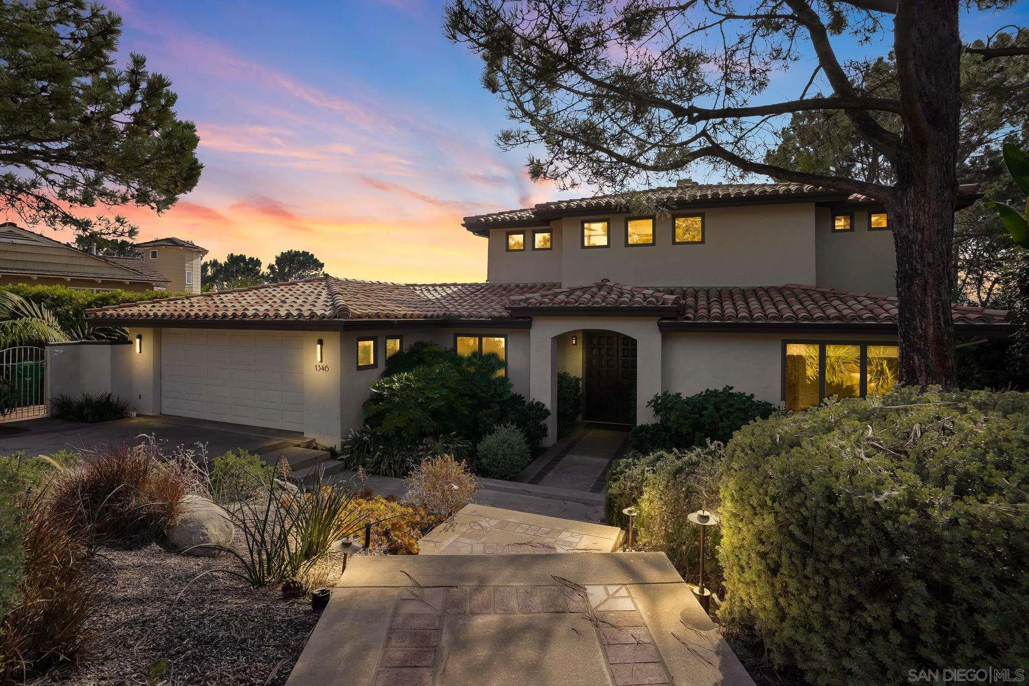 1346 Crest Road Del Mar, CA 92014 - Photo 64 of 64 a front view of a house with a yard